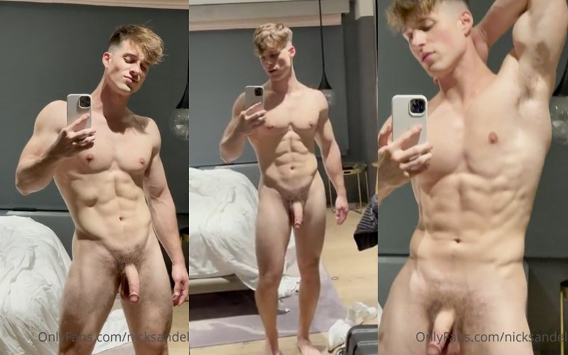 Nick Sandell shows off his body in the mirror