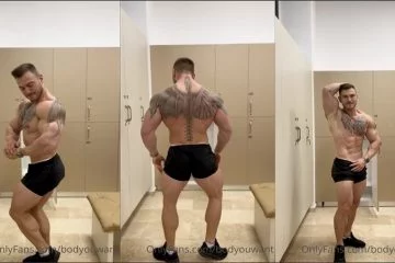 Bodyouwant flexes in the locker room