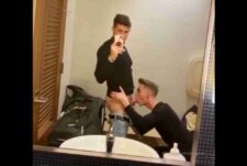 Alex Grant with a twink in a public restroom