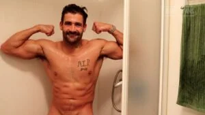 Showing off my muscles in the shower Brett King