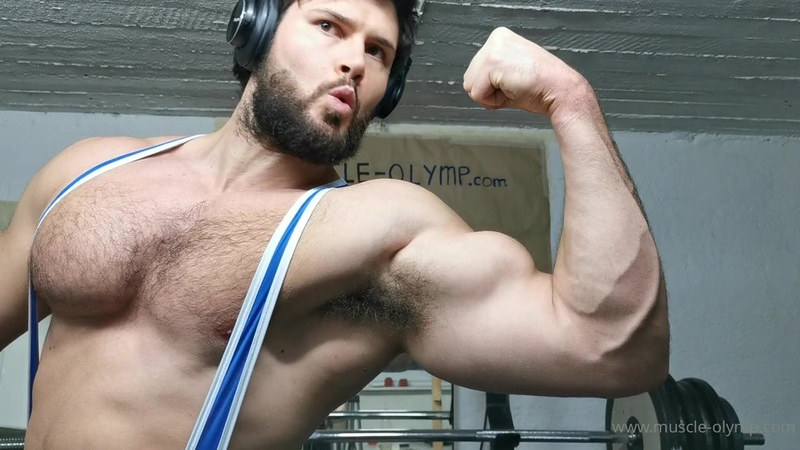 Showing off my muscles in my wrestling singlet - BeastMuscleShow - JustTheGays.com - Stream the newest and hottest gay videos for free from your favorite performers from OnlyFans, Just for Fans, and 4myfans