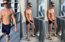 Young fit guy jerks off on the balcony – U11875612