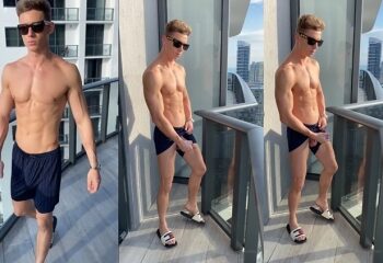 Young fit guy jerks off on the balcony – U11875612