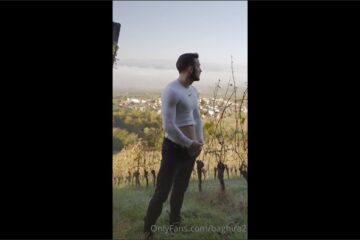 Baghira2 plays with his cock in the vineyard