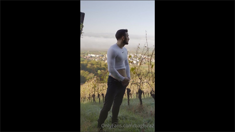 Baghira2 plays with his cock in the vineyard
