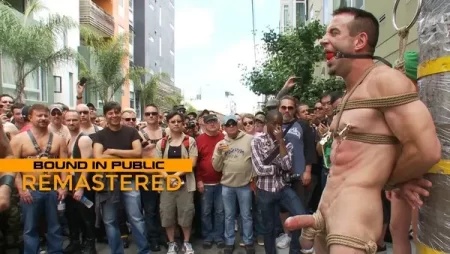 Muscle Slave Is Stripped Naked, Used and Humiliated While Hordes of People Take Photos