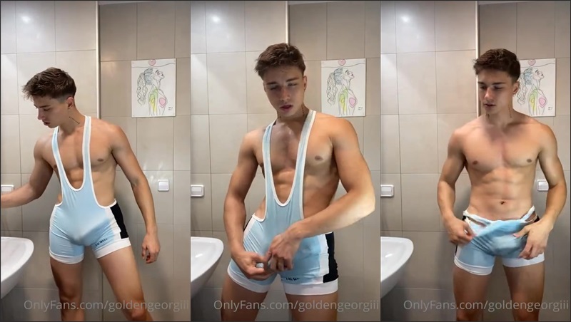 goldengeorgiii shows off his cock in a wrestling singlet