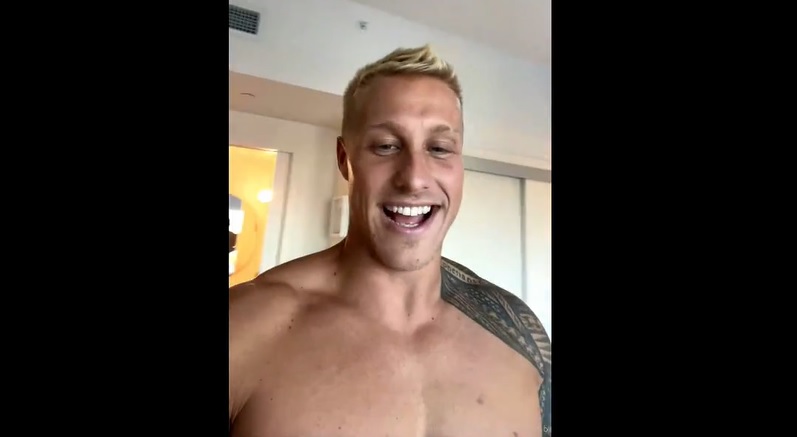 Nathan Webb shows off his body