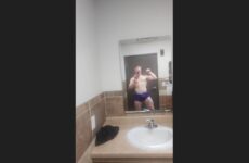 Flexing hard in the mirror – Gymbruh