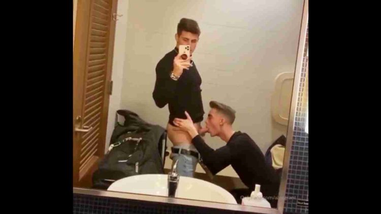 Alex Grant with a twink in a public restroom