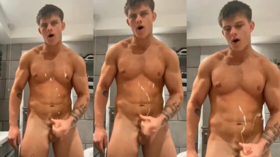 Beefy stud jerks off in the bathroom