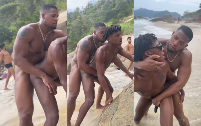 Hard black breeding on a public beach