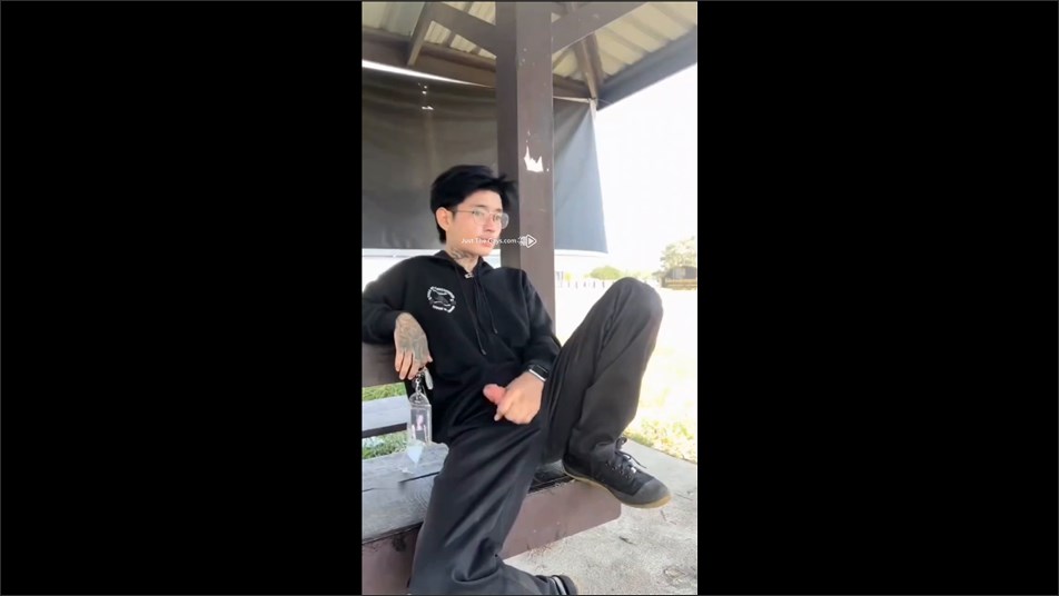 Asian twink jerks off at a bus stop