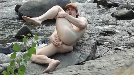 Tom The Cowboy fucks himself with a dildo by the river and then cums